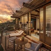 Bupenyu Lodge perched above the Batoka Gorge overlooking the Zambezi River at sunset
